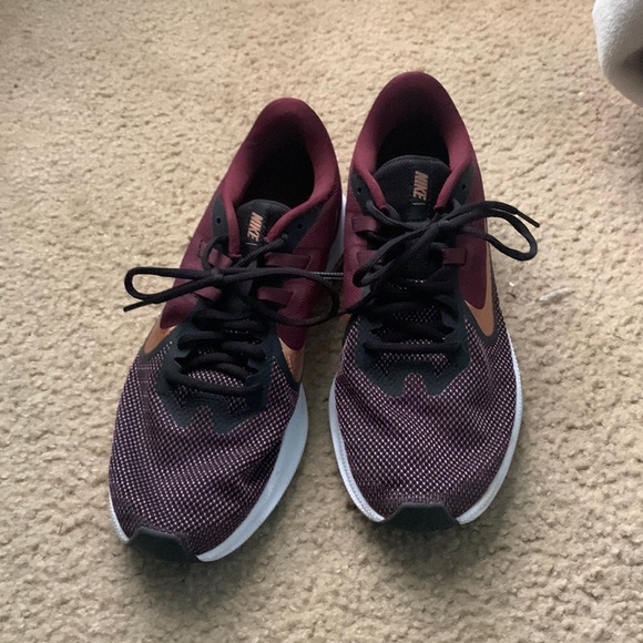 Nike Shoes - nike womens running shoes. worn outside a few times. a little dirt on them
